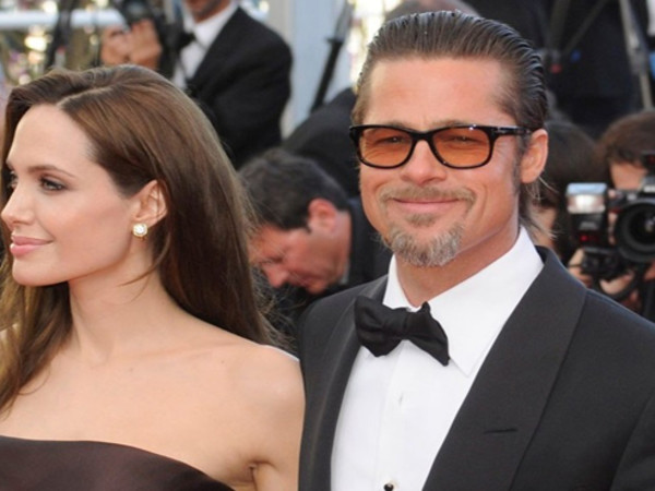 Jaloerse Angelina Jolie zet kinderoppas aan de deur