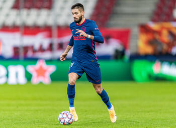 Carrasco leidt Atlético Madrid richting de knock-outfase van de Champions League