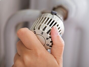 De verwarming een graad lager